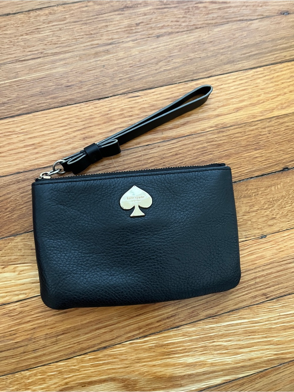 kate spade Pebbled Black Leather Wristlet with Gold Spade Emblem